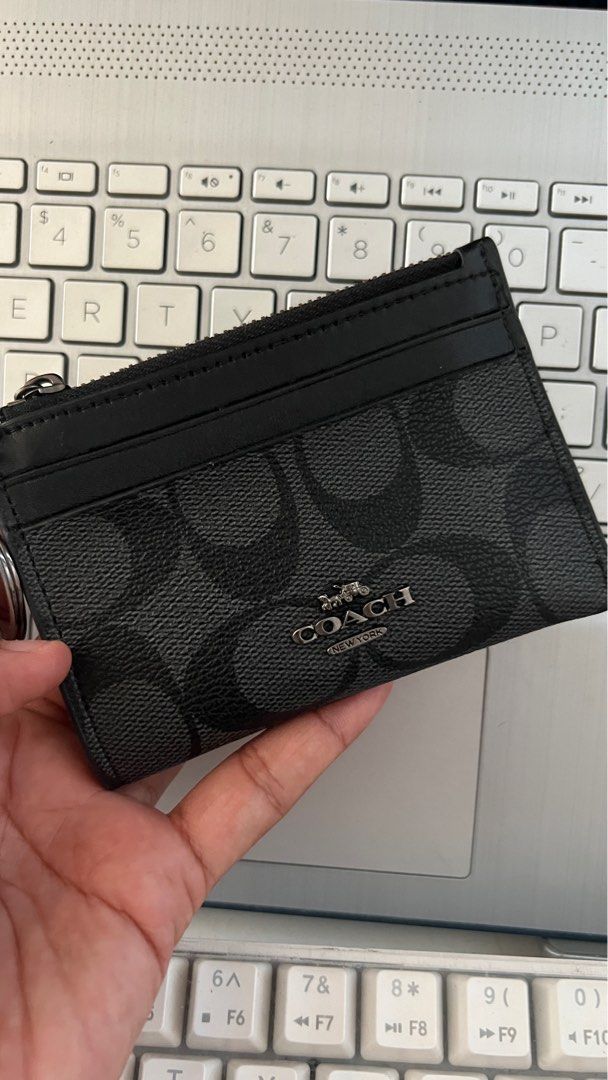 Coach card wallet (Category: Wallets & Card holders) located in Pasay City. Submitted by michell8 (Listing ID 1351174912, Image 2). Description: Looks new once used with box paper bag and tag .