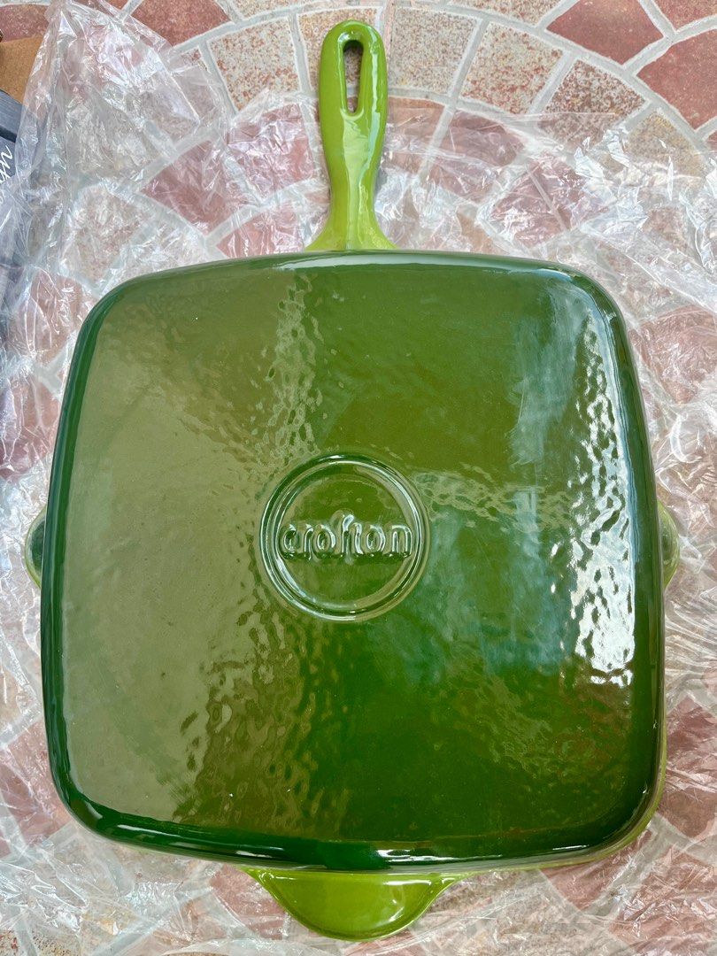 Crofton Professional Cast Iron Griddle Pan (Category: Cookware & Accessories) located in La Trinidad. Submitted by whatnotcollections (Listing ID 1361886035, Image 3). Description: In excellent condition. The pan has a light green enamel coating on the exterior and a black interior. Heavy Duty Cast Iron Body and a High Quality 3 Layer Exterior Enamel Coating..