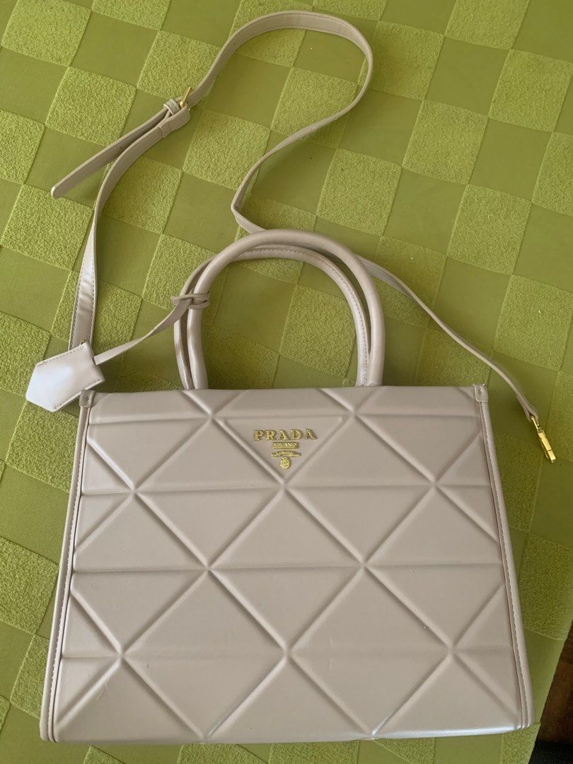 Prada 2way (Category: Luxury Bags & Wallets) located in Santa Rosa. Submitted by declutteringthings08 (Listing ID 1361837470, Image 2). Description: Selling my preloved bag no issue RFS: Declutterring .