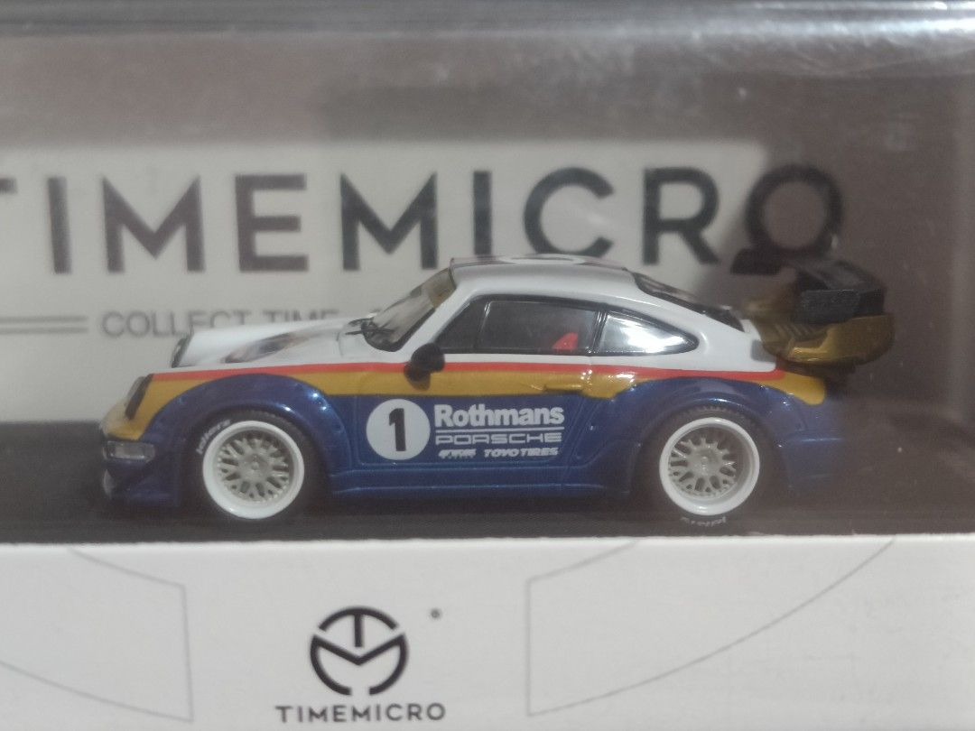 TimeMicro RWB Porsche 964 Rothmans (Category: Vehicle & Diecast Models) located in Mandaluyong City. Submitted by OttO.Moto (Listing ID 1361799523, Image 2). Description: **PLEASE READ FULL LISTING DETAILS BEFORE MAKING AN OFFER** **PRICES ARE FIRM** **PASS SA KWENTO** 1/64 diecast Sealed in box with acrylic case and base HTF Rothmans livery Location Mandaluyong Gcash payment Shipping at buyer's expense Thank you for looking.