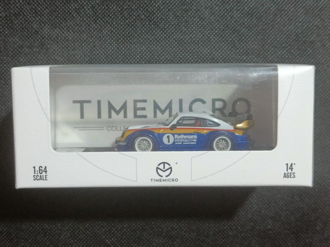 TimeMicro RWB Porsche 964 Rothmans (Category: Vehicle & Diecast Models) located in Mandaluyong City. Submitted by OttO.Moto (Listing ID 1361799523, Image 1). Description: **PLEASE READ FULL LISTING DETAILS BEFORE MAKING AN OFFER** **PRICES ARE FIRM** **PASS SA KWENTO** 1/64 diecast Sealed in box with acrylic case and base HTF Rothmans livery Location Mandaluyong Gcash payment Shipping at buyer's expense Thank you for looking.