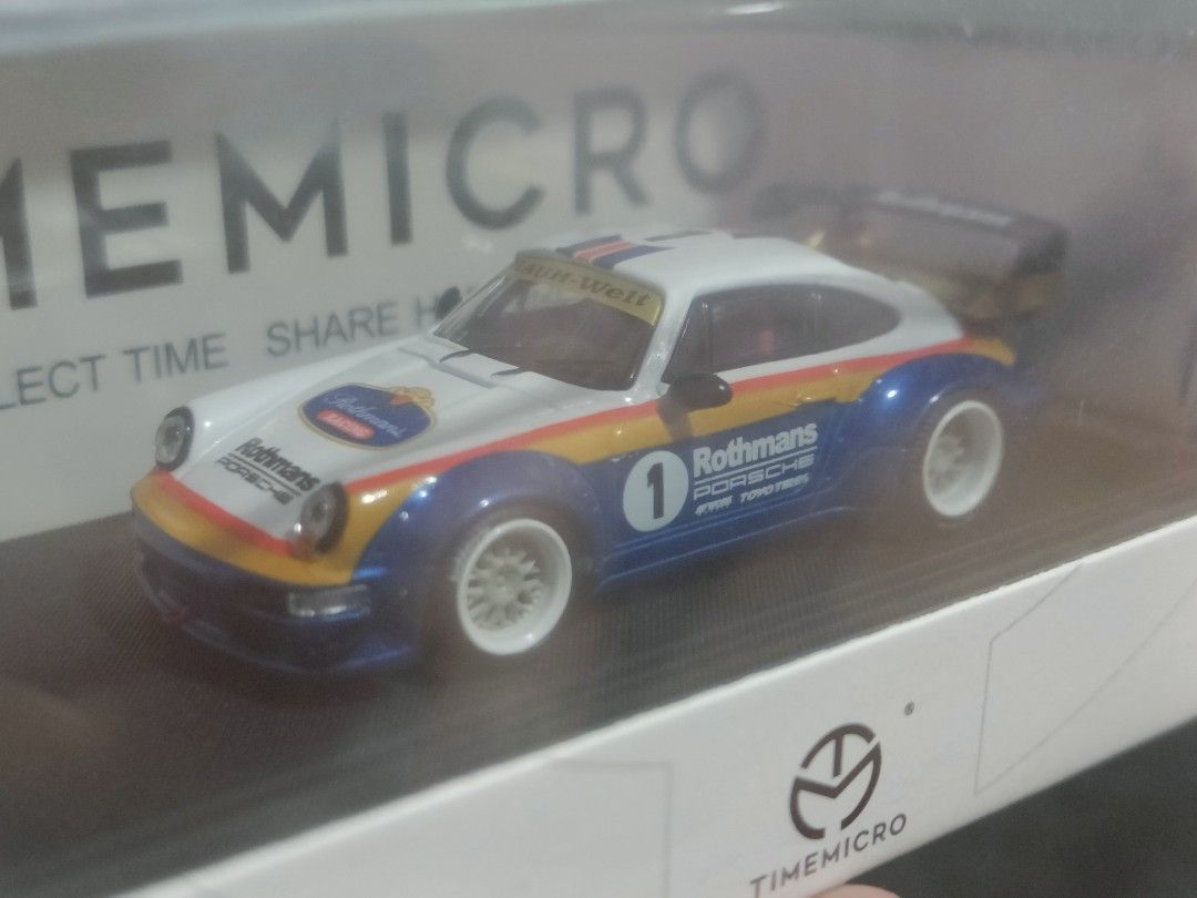 TimeMicro RWB Porsche 964 Rothmans (Category: Vehicle & Diecast Models) located in Mandaluyong City. Submitted by OttO.Moto (Listing ID 1361799523, Image 3). Description: **PLEASE READ FULL LISTING DETAILS BEFORE MAKING AN OFFER** **PRICES ARE FIRM** **PASS SA KWENTO** 1/64 diecast Sealed in box with acrylic case and base HTF Rothmans livery Location Mandaluyong Gcash payment Shipping at buyer's expense Thank you for looking.