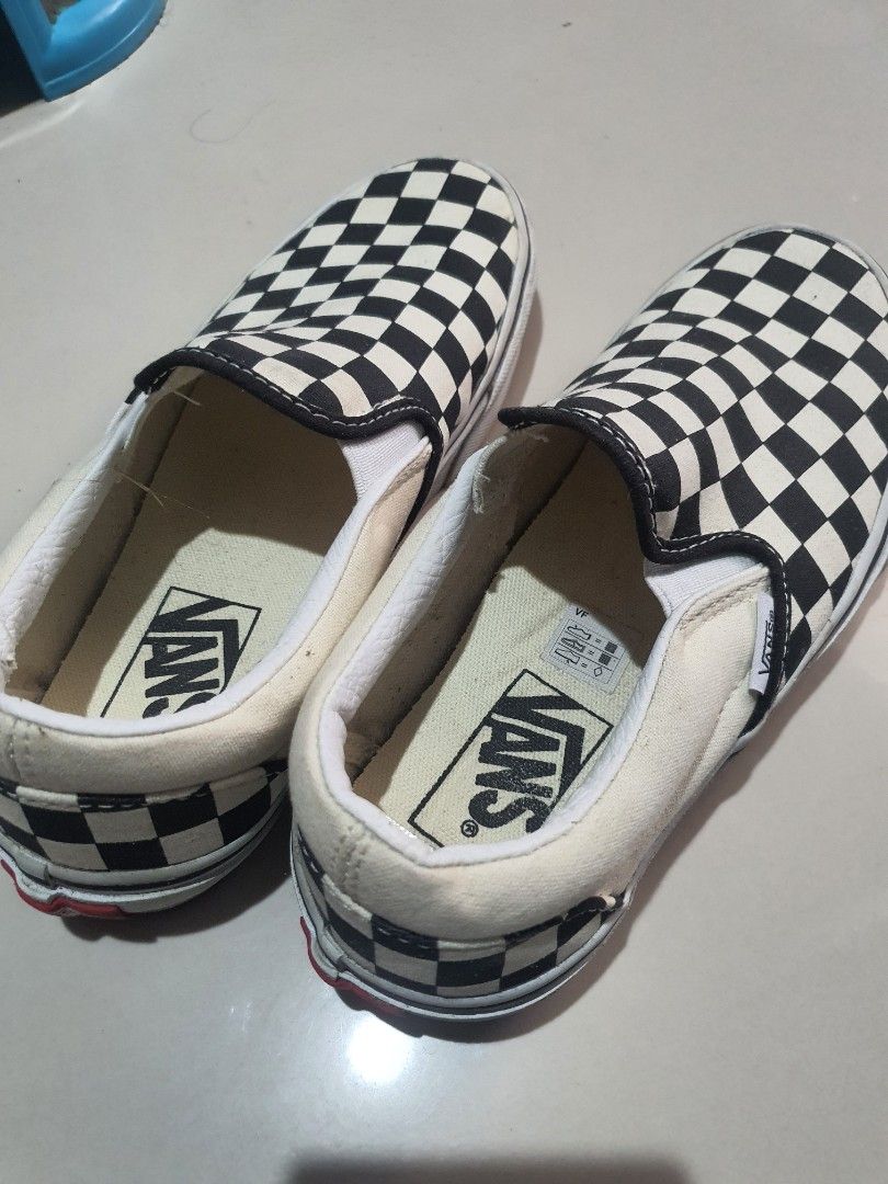 Vans Classic Slip-on (2shoes) (Category: Sneakers) located in Cavite. Submitted by heyimsosab (Listing ID 1361861341, Image 3). Description: Vans Classic Slip on Checkerboard and Triple white size 6.0 women rfs: masikip na po sa paa ko needs minor washing/cleaning but okay na okay pa po ung checkerboard, used only 3 to 5x. ung white po, needs washing/cleaning po talaga, used many times. and a little issue po dun sa rubber sa gilid. but good sole 