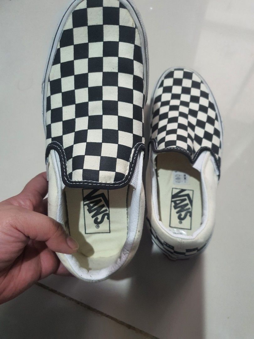 Vans Classic Slip-on (2shoes) (Category: Sneakers) located in Cavite. Submitted by heyimsosab (Listing ID 1361861341, Image 2). Description: Vans Classic Slip on Checkerboard and Triple white size 6.0 women rfs: masikip na po sa paa ko needs minor washing/cleaning but okay na okay pa po ung checkerboard, used only 3 to 5x. ung white po, needs washing/cleaning po talaga, used many times. and a little issue po dun sa rubber sa gilid. but good sole 