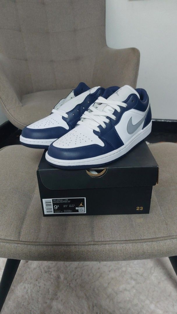 Air Jordan 1 Low Midnight Navy (Category: Sneakers) located in Quezon City. Submitted by cisnarf (Listing ID 1361374623, Image 2). Description: - Bought from Footlocker U.P. Town Center. -Compllete with receipt. -Left pair laced. -Product Code 553558-141.