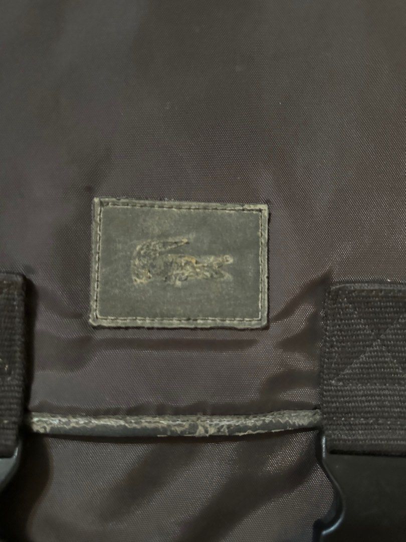 Authentic Lacoste mens sling messenger bag (Category: Sling Bags) located in Cebu City. Submitted by drebdy (Listing ID 1362062401, Image 3). Description: Authentic Lacoste mens sling messenger bag all zippers and locks good working issue only on leather trims fading bak bak and stains but inside of the bag is very clean and good item in cebu cab ship thru jnt at buyers cost prior gcash paymebt required.