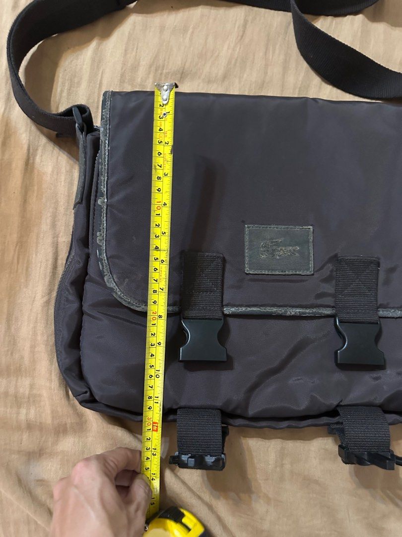 Authentic Lacoste mens sling messenger bag (Category: Sling Bags) located in Cebu City. Submitted by drebdy (Listing ID 1362062401, Image 2). Description: Authentic Lacoste mens sling messenger bag all zippers and locks good working issue only on leather trims fading bak bak and stains but inside of the bag is very clean and good item in cebu cab ship thru jnt at buyers cost prior gcash paymebt required.