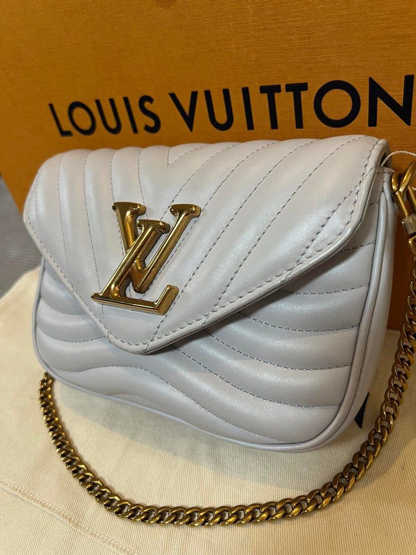 Authentic Lv New Wave in Lilac (Category: Luxury Bags & Wallets) located in Quezon City. Submitted by jhaediah (Listing ID 1362063542, Image 3). Description: LV New Wave in Lilac Inclusions: Chain Strap, Long strap, Coin purse, Dustbag, box & paperbag code : 61 .
