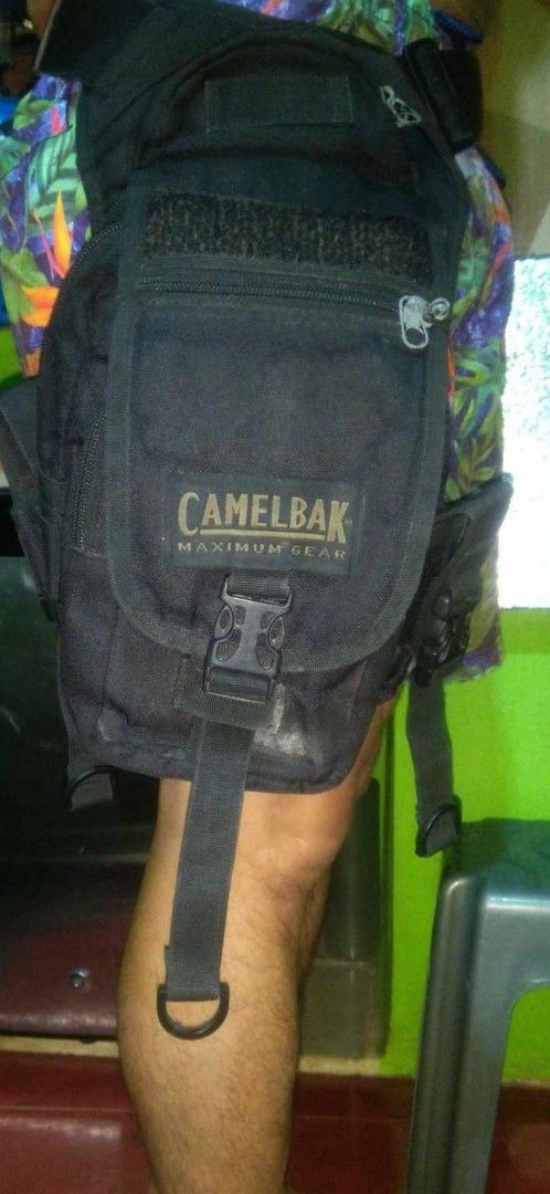 Camelbak sling/leg bag tactical (Category: Sling Bags) located in Mandaluyong City. Submitted by gambitsanity (Listing ID 1362069511, Image 3). Description: camelbak sling leg/bag tactical authentic 3 storage 2 divider adjustable straps for leg, hip or shoulder 4 pockets large capacity storage quality and durable hindi sya katulad nung nabibili sa mga online shop water resistant weather proof no damage or what so ever needs cleaning lang. bought 