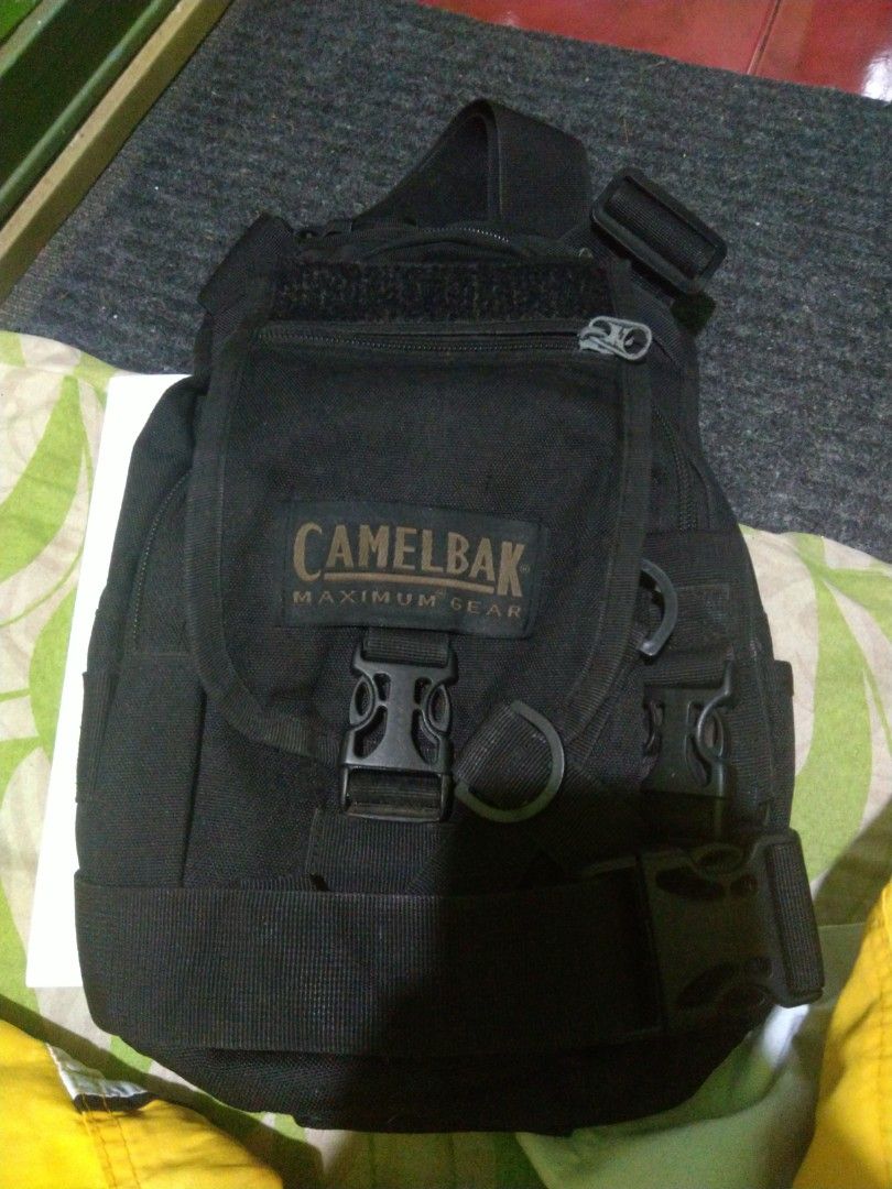 Camelbak sling/leg bag tactical (Category: Sling Bags) located in Mandaluyong City. Submitted by gambitsanity (Listing ID 1362069511, Image 1). Description: camelbak sling leg/bag tactical authentic 3 storage 2 divider adjustable straps for leg, hip or shoulder 4 pockets large capacity storage quality and durable hindi sya katulad nung nabibili sa mga online shop water resistant weather proof no damage or what so ever needs cleaning lang. bought 