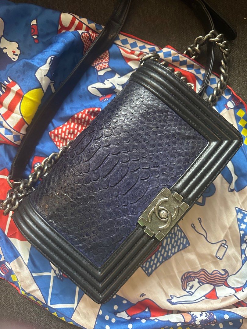 CC Leboy (Category: Luxury Bags & Wallets) located in Batangas. Submitted by kulilayfinds (Listing ID 1361879649, Image 2). Description: A personal favorite! Has signs of use but so pretty in person! Unique snakeskin design in this dark blue color. With flaws so selling low. RFS : decluttering.