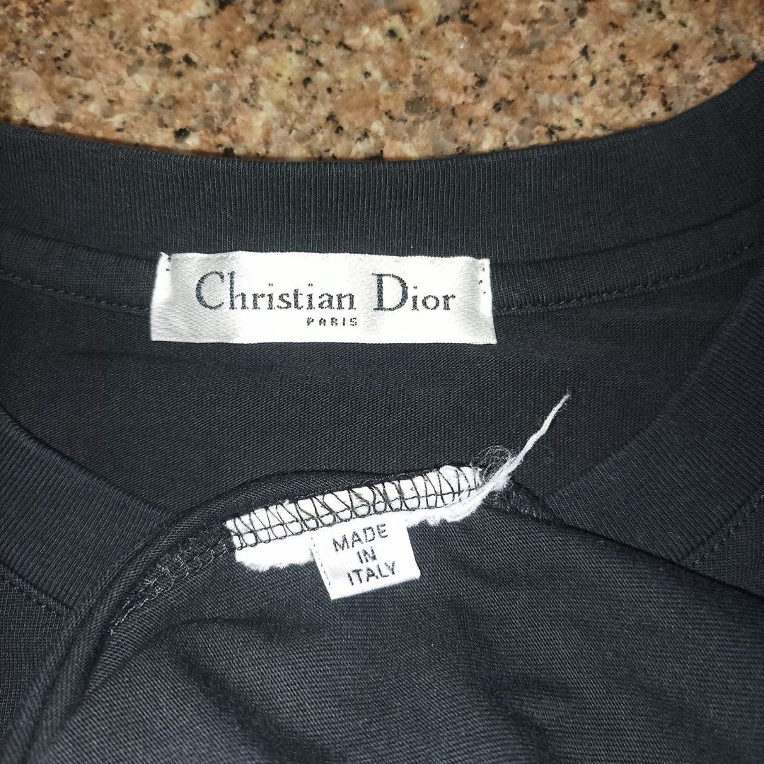 Christian Dior Black Shirt (Category: Tshirts & Polo Shirts ) located in Davao. Submitted by gcollection (Listing ID 1362045129, Image 2). Description: Christian Dior Black Shirt Made in Italy Size: Medium (20” x 27”) Condition: Excellent Color rate: 9.6/10 No Issues / Cut Wash Tag Only / OFF LEGIT .