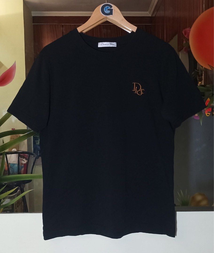 Christian Dior Black Shirt (Category: Tshirts & Polo Shirts ) located in Davao. Submitted by gcollection (Listing ID 1362045129, Image 1). Description: Christian Dior Black Shirt Made in Italy Size: Medium (20” x 27”) Condition: Excellent Color rate: 9.6/10 No Issues / Cut Wash Tag Only / OFF LEGIT .