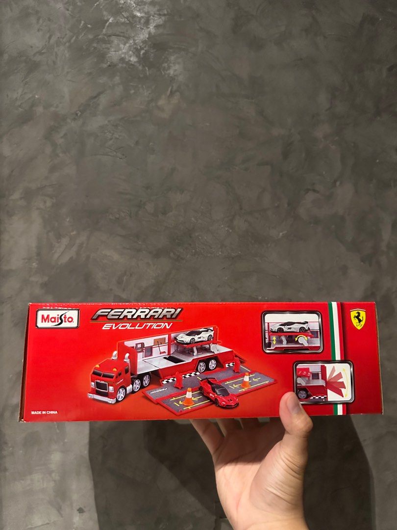 Ferrari Evolution Hauler Maisto (Category: Vehicle & Diecast Models) located in Quezon City. Submitted by tylorddg (Listing ID 1362001411, Image 2). Description: For Sale/For Trade Maisto - Ferrari Evolution Hauler 700 Php cainta-pasig lalamove-lbc-pick up gcash-bdo.