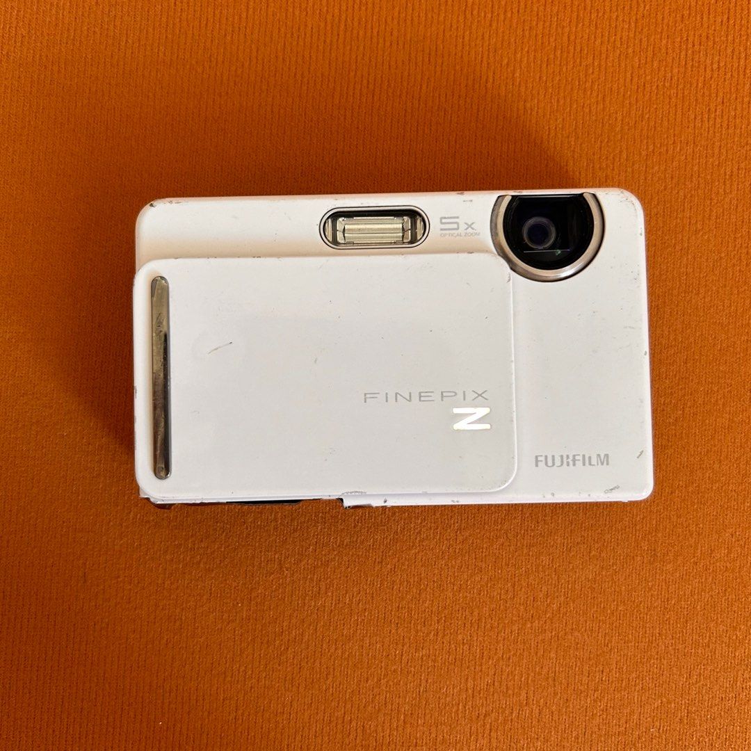 Fujifilm z3000 digital camera digicam (Category: Cameras) located in Manila. Submitted by pl4y_it_4g4in (Listing ID 1362036888, Image 1). Description: Issue •no battery door pero may battery lock naman. You can put a sticker or tape (5th photo) • screen may lines sa screen output not affected and mejo may bubbles yung cover ng screen (6th and 7th photo) Pls check photos for cosmetic condition Flash ok Touch screen ok (responsive) Zoom in ok Zoom 
