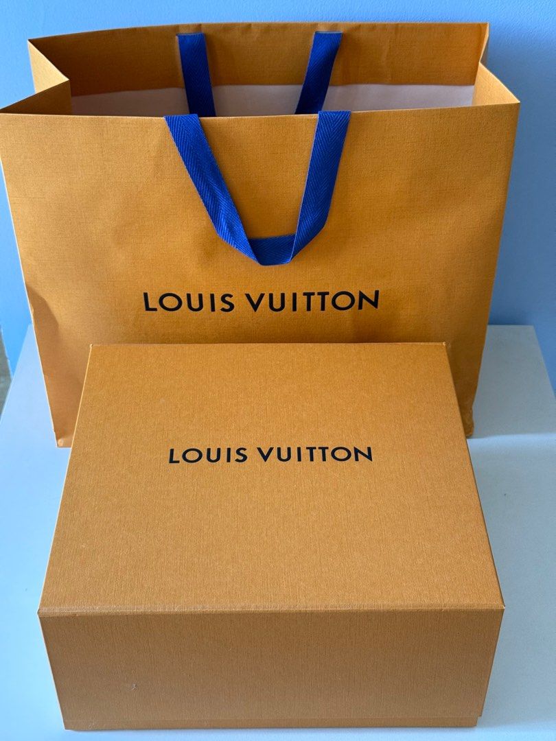 Louis Vuitton Box and Paper Bag (Category: Accessories) located in Singapore. Submitted by salleojuseyo (Listing ID 1362030563, Image 1). Description: Box 27.5cm x 30cm x 15cm height Paper Bag 40cm x 34cm height .