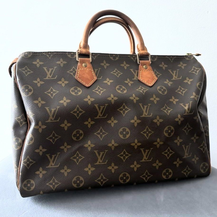 LV Monogram Speedy (Category: Luxury Bags & Wallets) located in Manila. Submitted by declutterrrrrrrph (Listing ID 1362105815, Image 1). Description: LV Monogram Speedy 35 Vintage • 14 x 11.8 in •35k only • retails at 125K • 8/10 condition • comes with dustbag.
