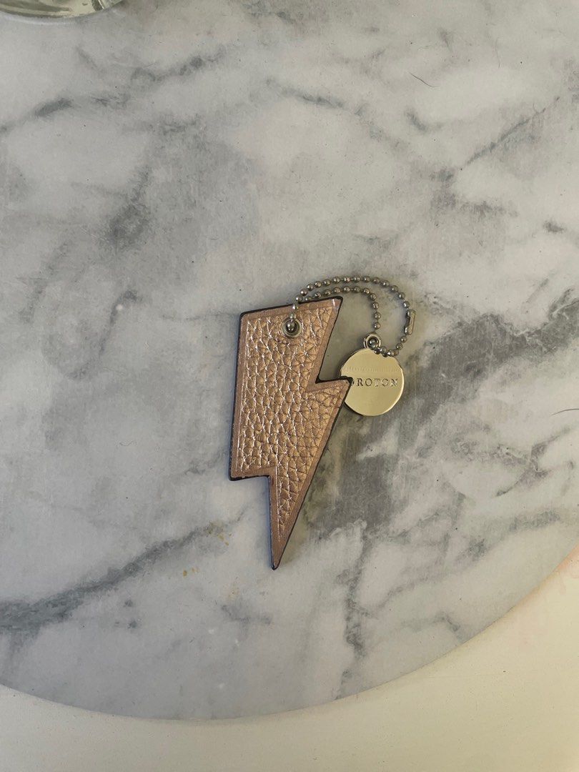 Oroton Lightning Bolt Bag Charm (Category: Women's Accessories) located in Sydney. Submitted by amyrmcg (Listing ID 1361963554, Image 3). Description: Adorable lightning bolt Oroton bag charm. RRP $50. Price includes shipping Australia wide .