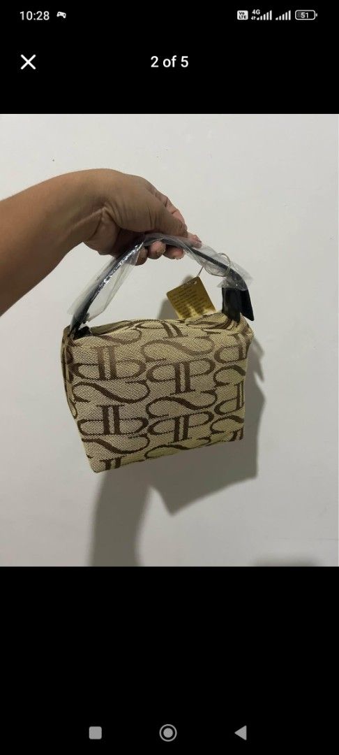 Small Pouch / Handbag 👜🤎 (Category: Luxury Bags & Wallets) located in Pasay City. Submitted by mjdiaz.43 (Listing ID 1362009764, Image 1). Description: ✅💯 Polo Rocket Santa Barbara unused kasya cp cute and handy 🥰 Last Price Posted !!! As is... take it or leave it dm for serious interesting buyers ty 😊.