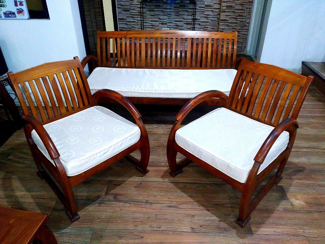 SOLID WOOD SOFA SET / SALA SET (Category: Sofas) located in Quezon City. Submitted by dekks_sulit (Listing ID 1361990747, Image 2). Description: HANDCRAFTED SOLID TEAK WOOD SOFA SET 1 3 SEATER 2 1 SEATER 1 COFFEE TABLE/CENTER TABLE 1 SIDE TABLE USED / PRELOVED.