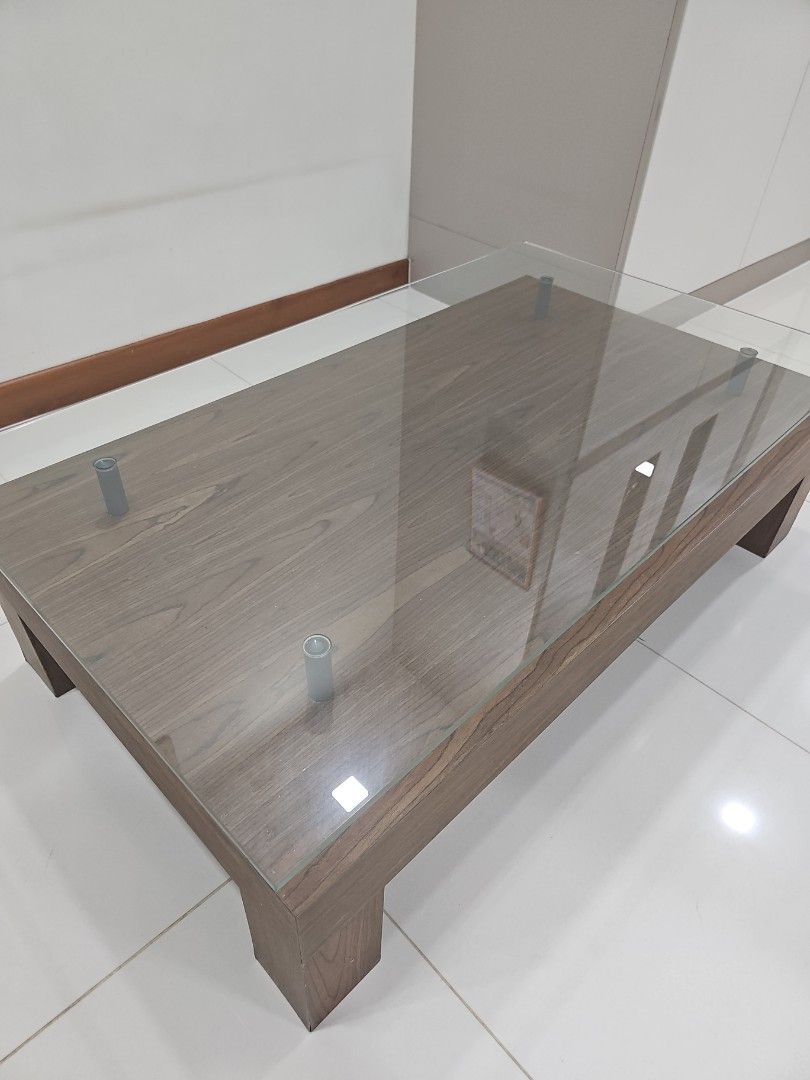 Table (Category: Tables & Sets) located in Singapore. Submitted by mightyforest.16a4ed (Listing ID 1362052679, Image 3). Description: Celeni wood table with tempered glass on top. Condition almost like new with no damages. Selling for cheap but delivery must be handled by yourself. 124cm(length)x72cm(breadth).