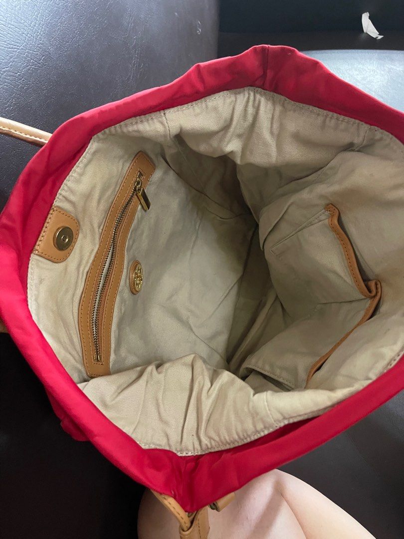 Tory Burch Red Cross-body Bag Authentic (Category: Luxury Bags & Wallets) located in Balanga. Submitted by macoylit21 (Listing ID 1361972513, Image 3). Description: Authentic Tory Burch Red Cross-body Bag Minor wear on handle .