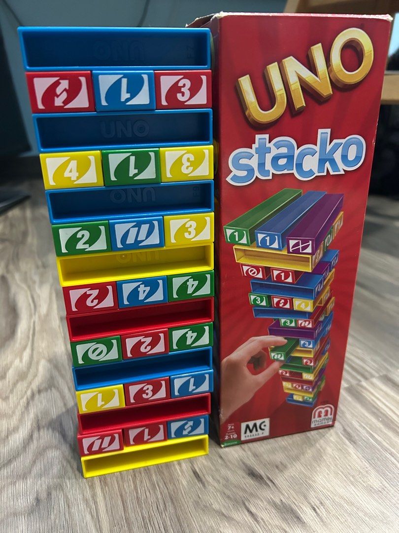 UNO Stacko (Category: Board Games & Puzzles) located in Singapore. Submitted by ambrokeman (Listing ID 1362102699, Image 2). Description: Flexible meet up locations Box has some signs of wear and tear.