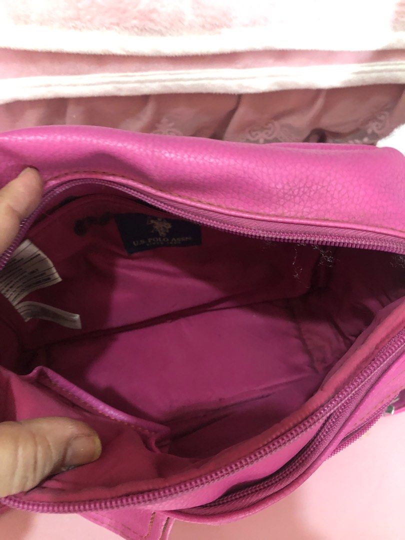 U.S Polo Association (Category: Cross-body Bags) located in Las Pinas. Submitted by juuzzmeeh2021 (Listing ID 1361956376, Image 3). Description: The bag has many pockets. Very nice in actual though need aome cleaning. I include in the photo the small flaws which is inside the bag naman.