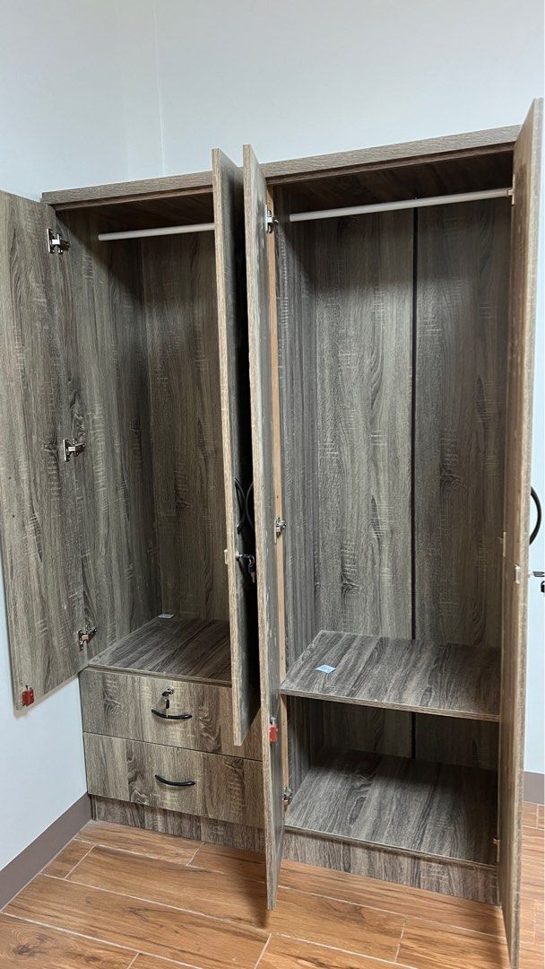 Wardrobe Cabinet (Category: Shelves, Cabinets & Racks) located in Makati City. Submitted by berniebones (Listing ID 1361963912, Image 3). Description: Wardrobe Cabinet Color: Brown Material: Wood Size: 180x120x47cm (HLW) With 2 drawers With lock keys I suggest personal pick-up to prevent damage..