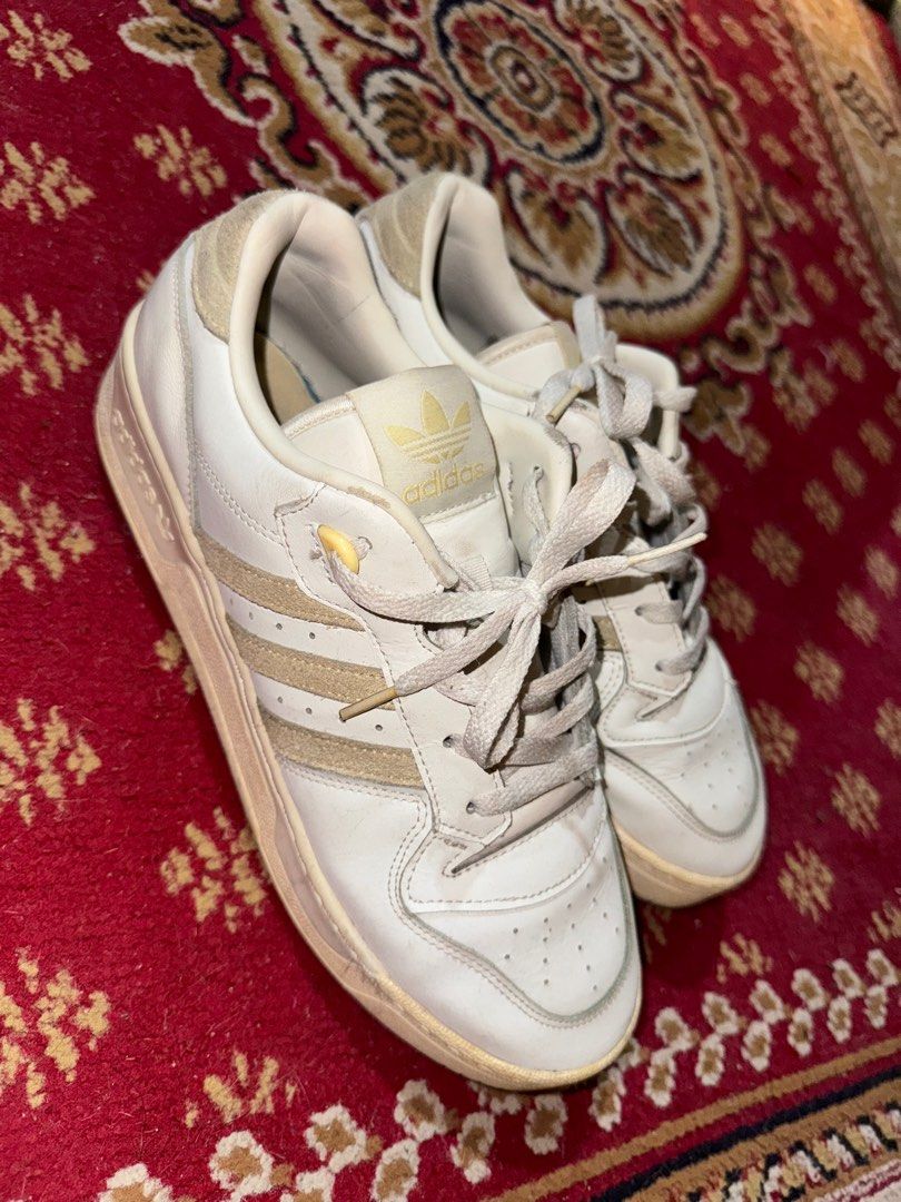 Adidas Rivalry Low Off White (Category: Sneakers) located in Pasay City. Submitted by jmplfx (Listing ID 1362185961, Image 1). Description: Adidas Rivalry Low Used rarely naluma sa pagkastock madumi lang kayo na maglaba hehe.