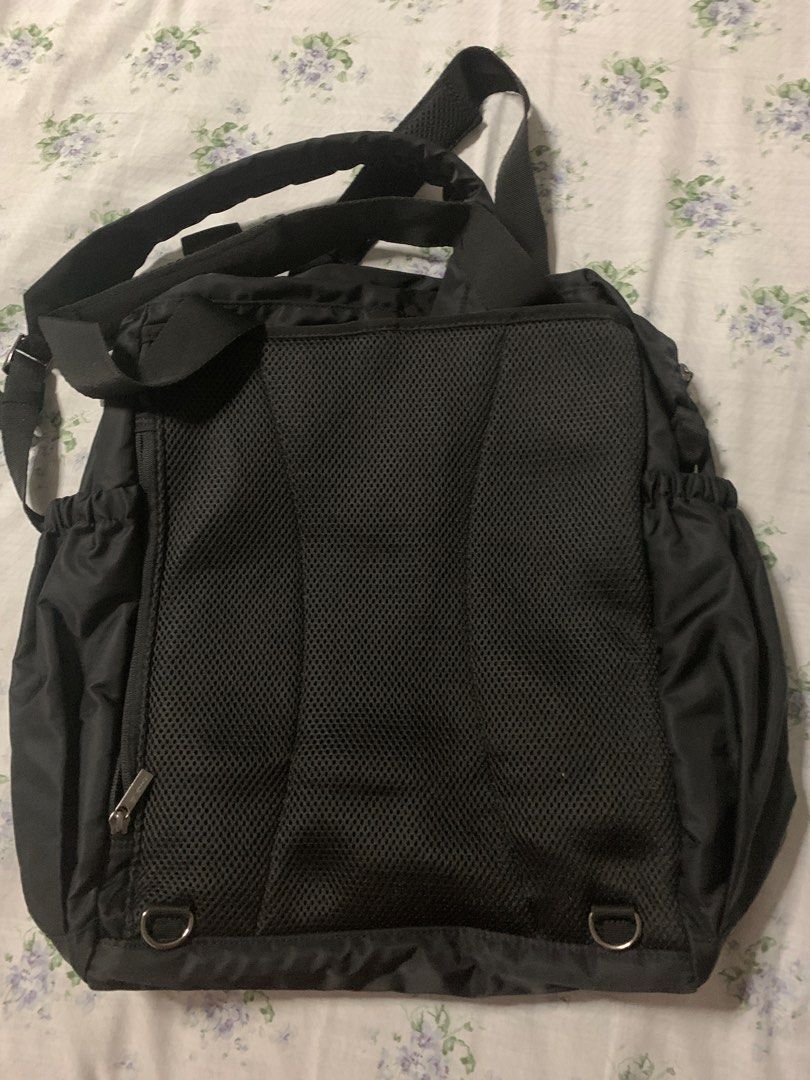 Agnes B mummy / baby tote bag / haversack backpack (Category: Bags & Wallets) located in Singapore. Submitted by justory (Listing ID 1362265972, Image 2). Description: Versatile bag. Can shoulder carry asvtote, can be backpack. Can use as shopper bag. Very spacious. Bottom comes with shoe compartment. Many pockets. Bought for around $300 in japan shopping mall. Also comes with a nappy pad which u can use as a seat pad or baby pram soft cushion. 1