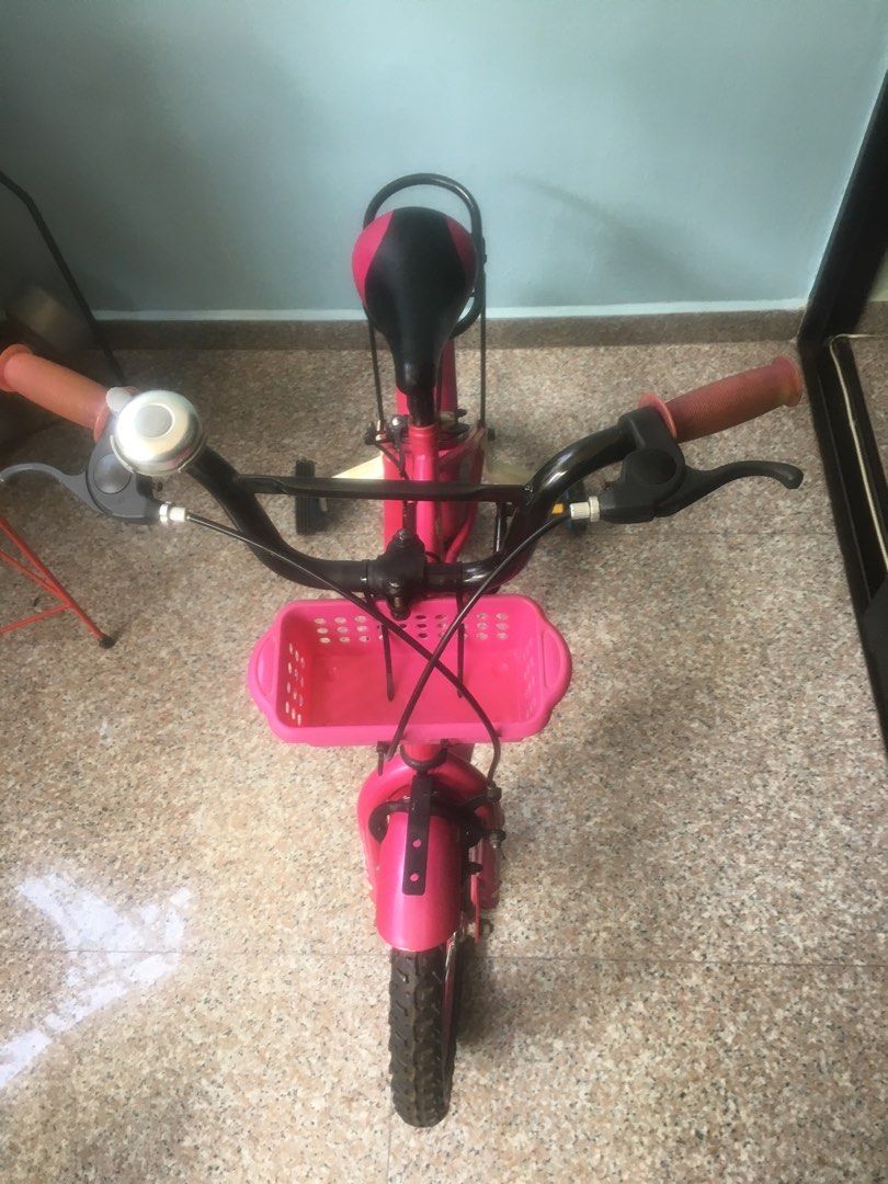 BMX Children bike (Category: Bicycles) located in Singapore. Submitted by PeterCPeter (Listing ID 1296337566, Image 2). Description: 14” BMX children bike, Very good condition clean & no rust, Well maintenance ,clean, for age 6~12yo, Handle bar n seat can adjust to height ,Fitted with training wheels..