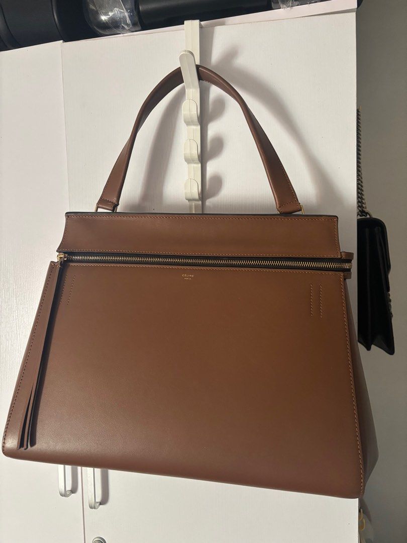 Celine edge bag (Category: Luxury Bags & Wallets) located in Makati City. Submitted by bravelion_cea1db (Listing ID 1362234873, Image 1). Description: Celine edge large bag Brown color RFS : decluttering 09338608996.