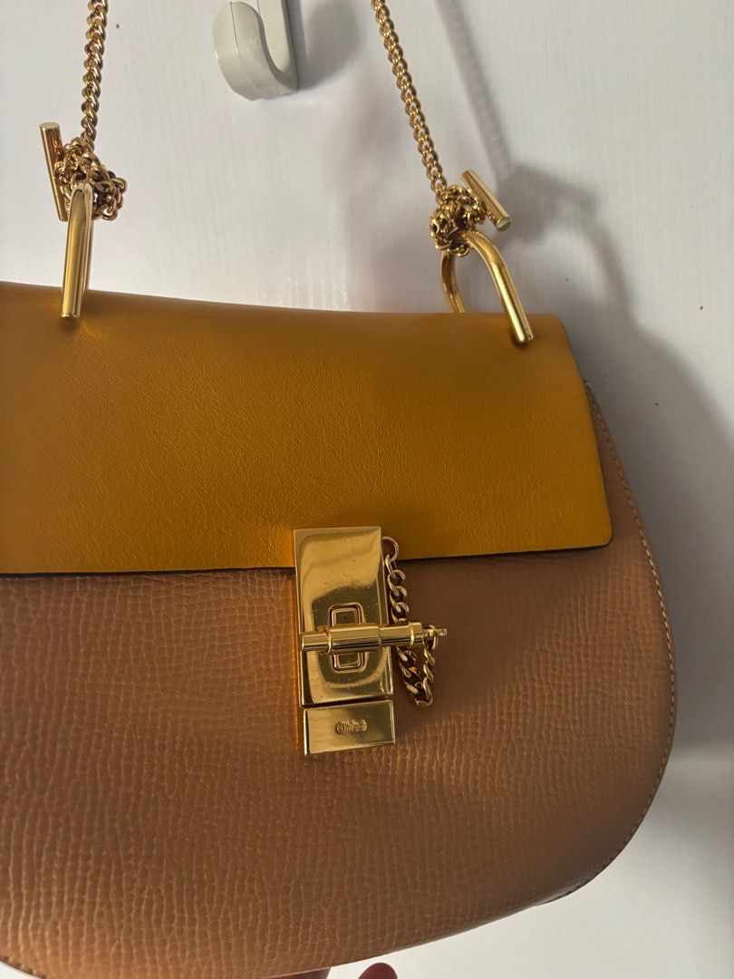 Chloe Drew bag medium (Category: Luxury Bags & Wallets) located in Makati City. Submitted by bravelion_cea1db (Listing ID 1362229504, Image 2). Description: Chloe Drew medium bag Sunflower orange All leather limited edition Complete with cards and dustbag Rfs: decluttering 09338608996 Call or text for more details.
