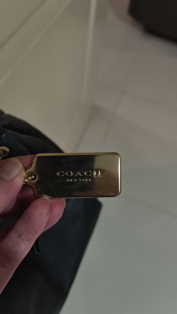 Coach shoulder bag c1881 f28966 (Category: Bags & Wallets) located in Singapore. Submitted by huasern (Listing ID 1362158280, Image 3). Description: price neg clean and well kept internal Color: Black pebble Quilted leather, Gold-tone hardware Foldlock flap closure Inside zip pocket & slip pocket Exterior back snap closure pocket Chain / leather strap with 24" drop Dimensions: Bottom Width: 8 in; Height: 6 in; Depth: 2.75 i.