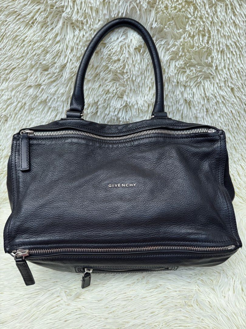 Givenchy Pandora Large Goatskin (Category: Luxury Bags & Wallets) located in Las Pinas. Submitted by Le.Pattie.Luxe (Listing ID 1362159508, Image 2). Description: 💯% Authentic 𝐆𝐢𝐯𝐞𝐧𝐜𝐡𝐲 𝐏𝐚𝐧𝐝𝐨𝐫𝐚 𝐋𝐚𝐫𝐠𝐞 𝐢𝐧 𝐆𝐨𝐚𝐭𝐬𝐤𝐢𝐧 🖤𝐏𝐡𝐩 𝟏𝟓𝐤🖤 ▪️No strap ▪️8/10 condition signs of wear on the handles & interior otherwise still in good condition ▪️Authenticated by B101 Revue ▪️Inclusion: provided satin dustbag ▪️Approx. Dimensions: 