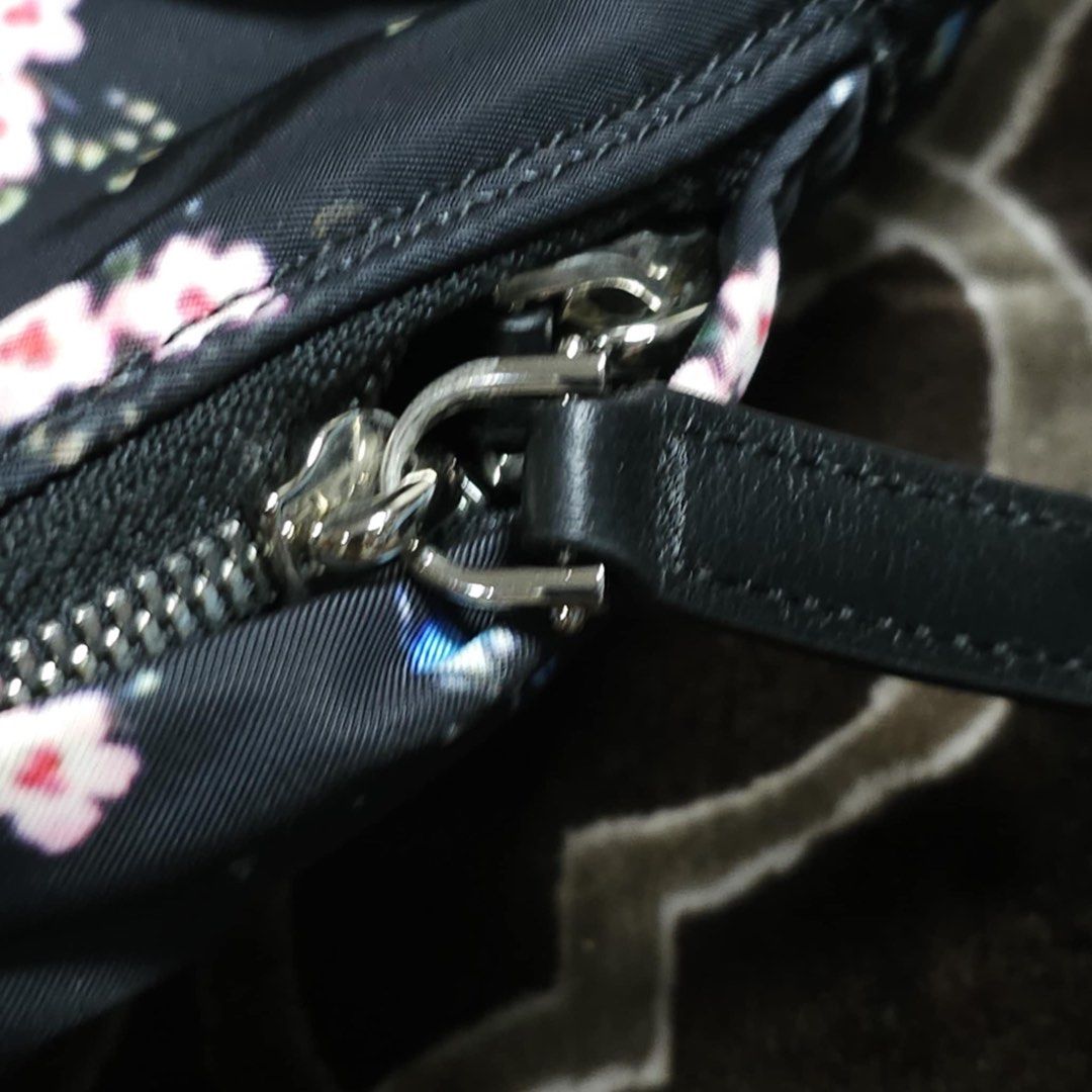 Givenchy Twill Nano Floral Backpack (Category: Luxury Bags & Wallets) located in Manila. Submitted by mahaechn (Listing ID 1362288650, Image 3). Description: ✨ PRELOVED ALERT ✨ Selling my Givenchy Twill Nano Floral Backpack for only ₱12,000!! Authentic and in amazing condition! 🌸 Perfect for: • A trendy everyday backpack • Adding a pop of floral elegance to your outfit 🌼 • Carrying your essentials in style ✨ Reason for Selling: Decluttering as 