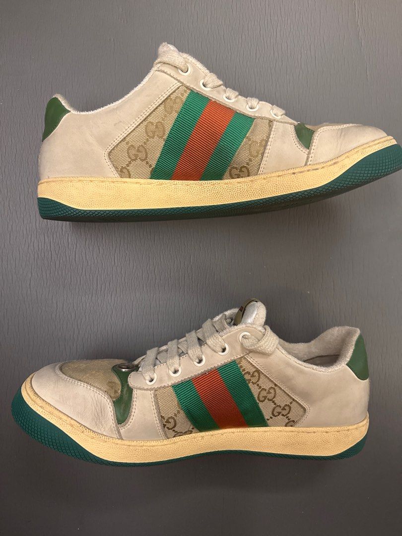 Gucci screener GG (Category: Sneakers) located in Quezon City. Submitted by madefor (Listing ID 1362190562, Image 2). Description: Lightly used Gucci Screener low-top sneakers in the classic GG Supreme canvas with green and orange Web stripe detailing. These have a vintage-effect finish straight from the factory, giving them a worn-in, retro sportswear vibe. Super versatile and still in great shape. Details: • Size: [8] • Colorway: Beige/Green/Or