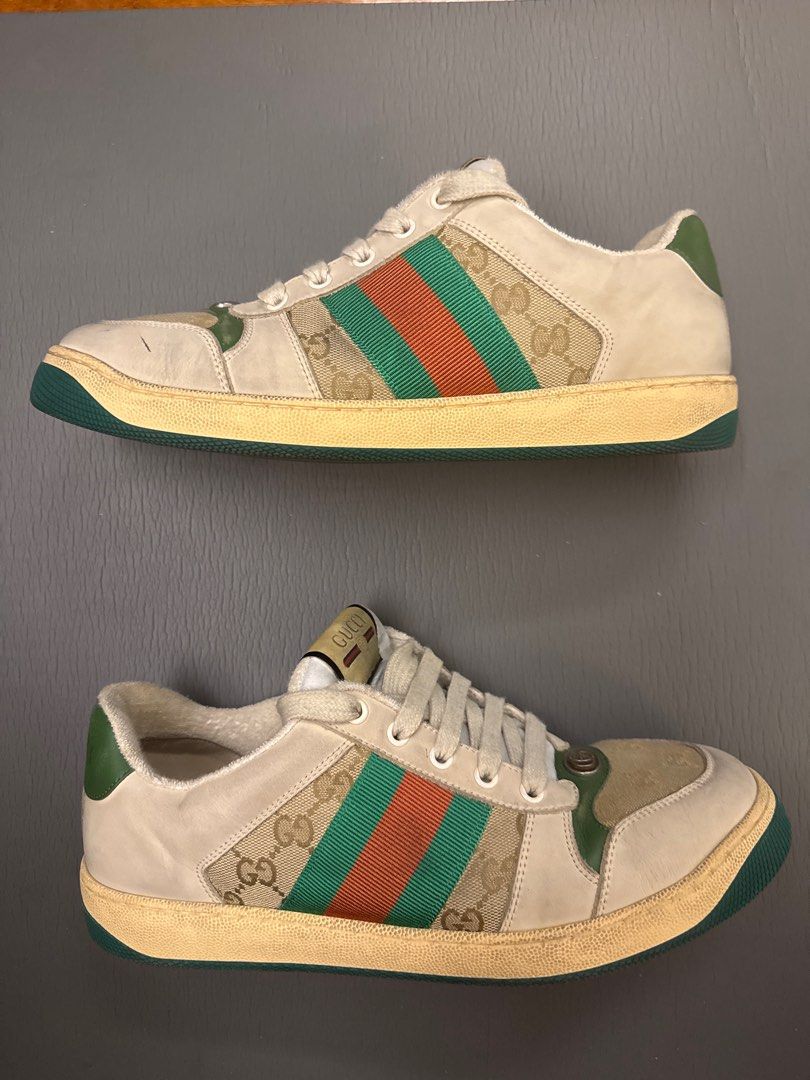 Gucci screener GG (Category: Sneakers) located in Quezon City. Submitted by madefor (Listing ID 1362190562, Image 1). Description: Lightly used Gucci Screener low-top sneakers in the classic GG Supreme canvas with green and orange Web stripe detailing. These have a vintage-effect finish straight from the factory, giving them a worn-in, retro sportswear vibe. Super versatile and still in great shape. Details: • Size: [8] • Colorway: Beige/Green/Or
