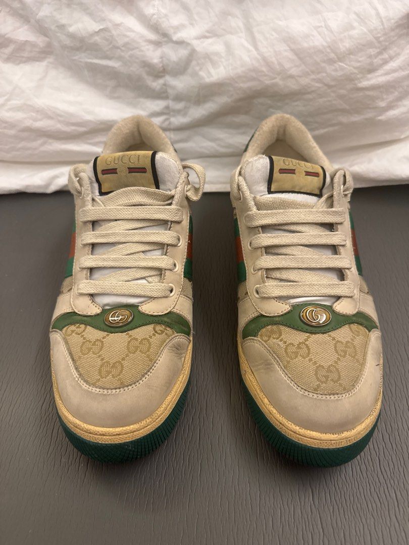 Gucci screener GG (Category: Sneakers) located in Quezon City. Submitted by madefor (Listing ID 1362190562, Image 3). Description: Lightly used Gucci Screener low-top sneakers in the classic GG Supreme canvas with green and orange Web stripe detailing. These have a vintage-effect finish straight from the factory, giving them a worn-in, retro sportswear vibe. Super versatile and still in great shape. Details: • Size: [8] • Colorway: Beige/Green/Or