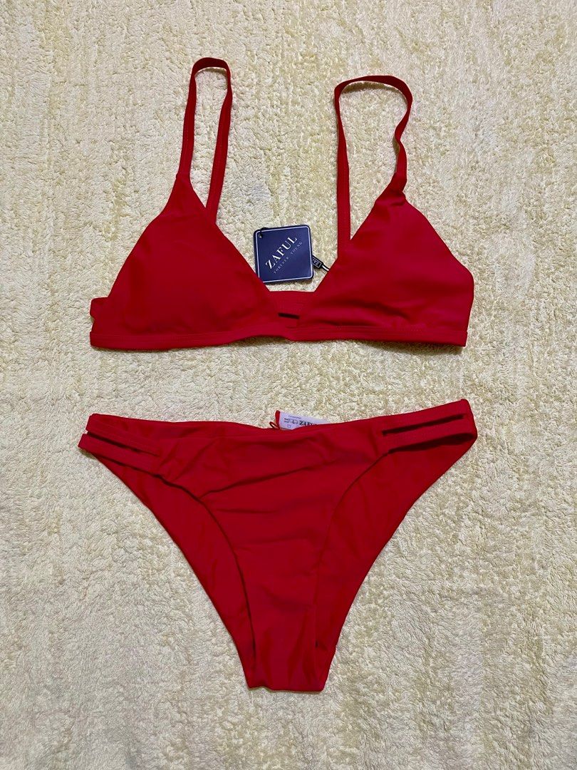 Hot Red Two Piece Swimsuit (L) (Category: Bikinis & Swimsuits) located in Muntinlupa City. Submitted by sarisariph_ (Listing ID 1362239999, Image 1). Description: •Zaful •Padded •Size: Large •Color may vary due toighting.