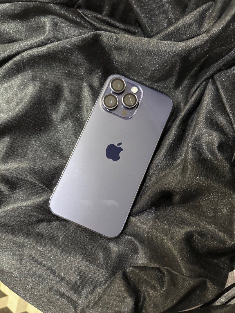 IPHONE 14 PRO MAX 1TB (Category: iPhone 14 Series) located in Quezon City. Submitted by abbynf (Listing ID 1362229844, Image 3). Description: Deep Purple 1TB Battery Health : 89 percent Has a scratch on one of the camera lens but no effect naman on camera. Conplete with box and unused cord.