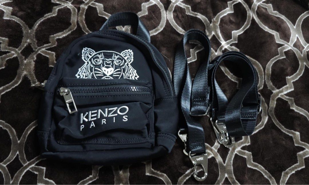 Kenzo Micro Convertible Nylon Backpack (Category: Luxury Bags & Wallets) located in Manila. Submitted by mahaechn (Listing ID 1362286413, Image 1). Description: ✨ PRELOVED ALERT ✨ Selling my Kenzo Micro Convertible Nylon Backpack for only ₱5,000!! Authentic and in excellent condition! Perfect for everyday use or as a stylish companion for your adventures. Fits your essentials with ease and adds a chic vibe to any outfit! Reason for selling: Declu