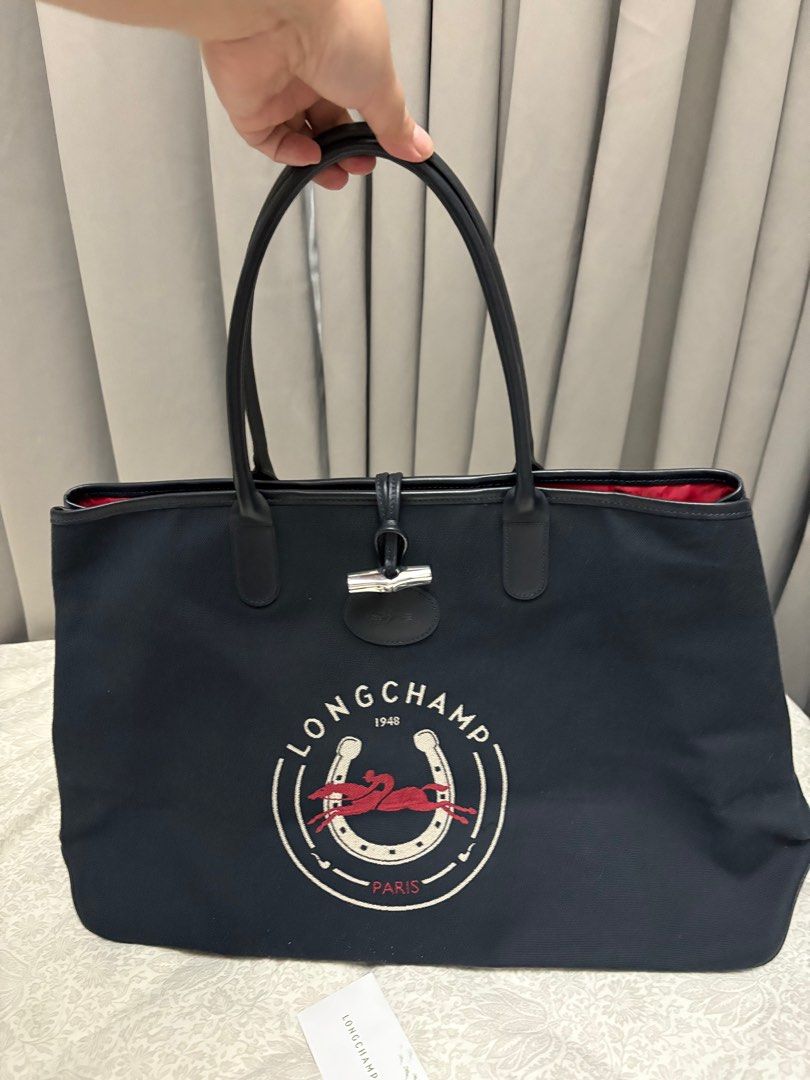 Longchamp Roseau XL bag (Category: Luxury Bags & Wallets) located in Cavite. Submitted by aerie1219 (Listing ID 1362250846, Image 1). Description: Bought from the UK. Bag only, i no longer have the dust bag and receipts. Very good condition with Just one light scratch at the bottom part (see photo). This is a large bag, great for weekend trips, if you want that extra nice bag to hold yourstuff. +Lsf by buyer.