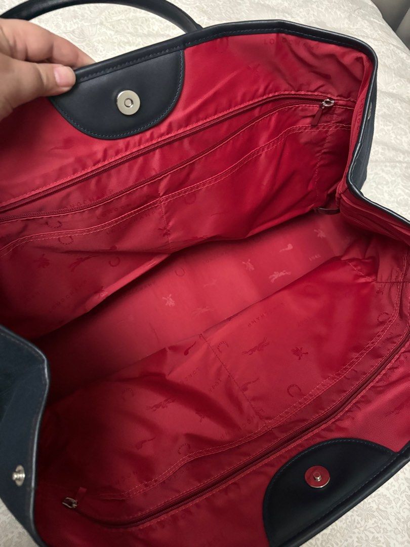 Longchamp Roseau XL bag (Category: Luxury Bags & Wallets) located in Cavite. Submitted by aerie1219 (Listing ID 1362250846, Image 2). Description: Bought from the UK. Bag only, i no longer have the dust bag and receipts. Very good condition with Just one light scratch at the bottom part (see photo). This is a large bag, great for weekend trips, if you want that extra nice bag to hold yourstuff. +Lsf by buyer.