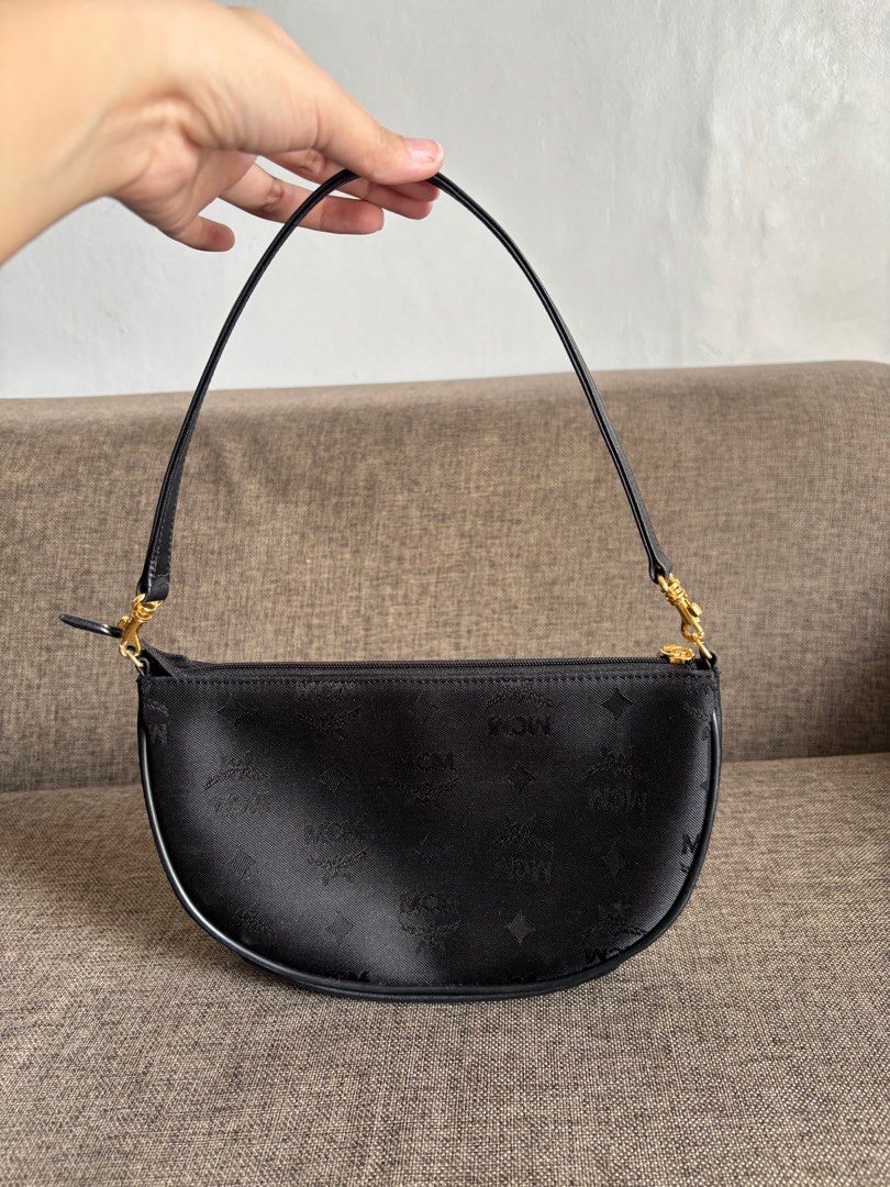 MCM POCHETTE BAG (Category: Luxury Bags & Wallets) located in San Fernando. Submitted by Bagstatic_luxuries (Listing ID 1362131375, Image 3). Description: CLEARANCE SALE 🤩🤩🤩 Authentic mcm bag Japan preloved self authentication .