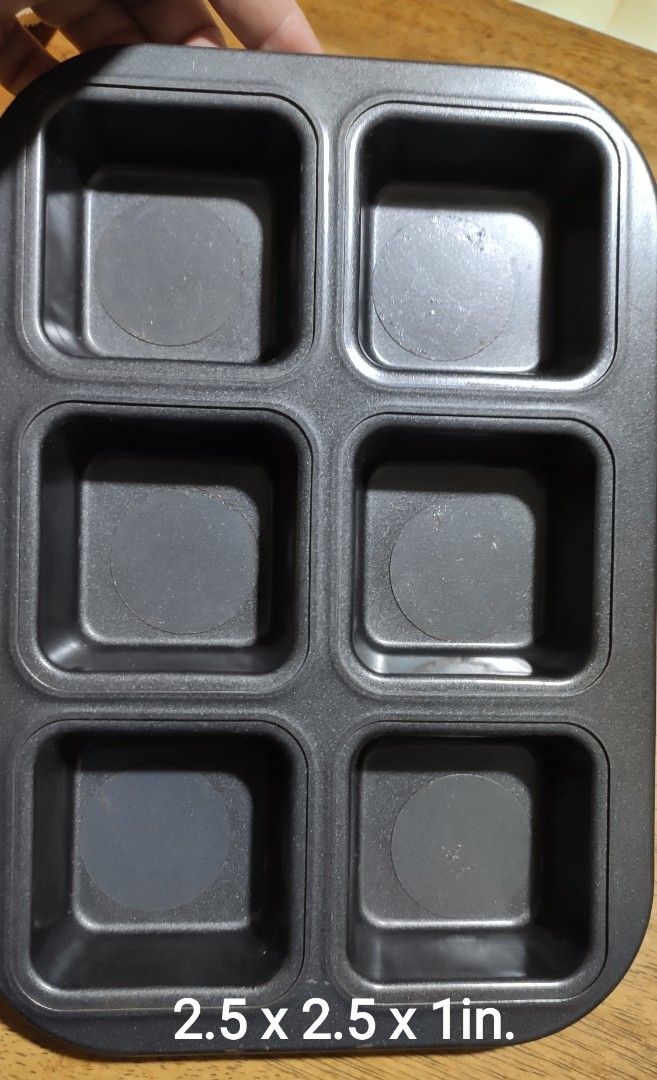 MUFFIN PAN (Category: Bakeware) located in Rizal. Submitted by baltiq (Listing ID 1362163933, Image 2). Description: muffin pan square 👉6 cavities, heavy, makapal 👉2.5 x 2.5 x 1in. deep 👉removable inner bottom for easy release (see flaws of round tins) 📌sold as is 💰MOP: GCash.