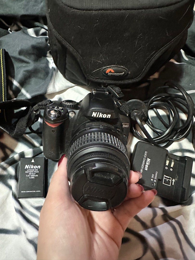 Nikon DSLR D40 (Category: Cameras) located in Taguig. Submitted by misskweezy (Listing ID 1362208683, Image 1). Description: Complete. No more box. Inclusions: Camera body Lens Battery charger Bonus! Will include a LowerPro bag and memory card reader. RFS: no longer using Location: Magtanggol, Pateros Buyer shoulders sf. PIOG.