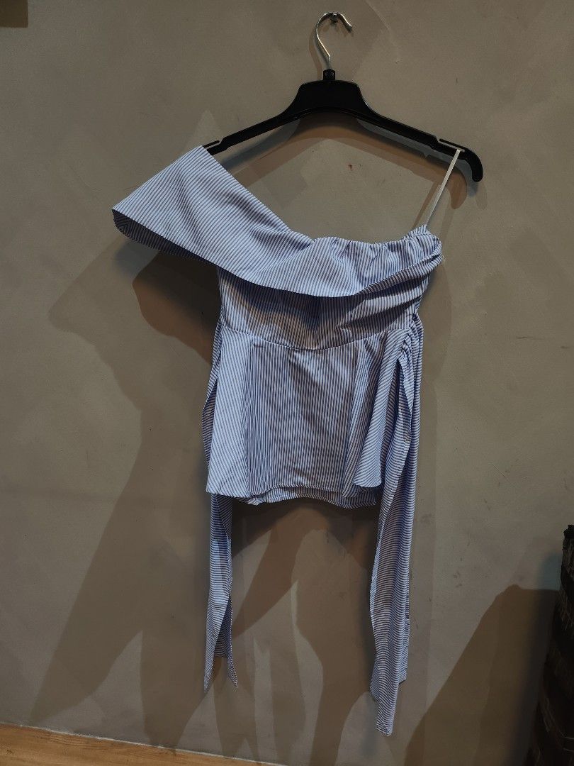 Off-Shoulder Asymmetrical Blue Striped Top (Category: Blouses) located in Manila. Submitted by pintarest (Listing ID 1362268833, Image 2). Description: Bought on Ig Just tried on Best fit medium Rfs: Flattering but too loose on me.