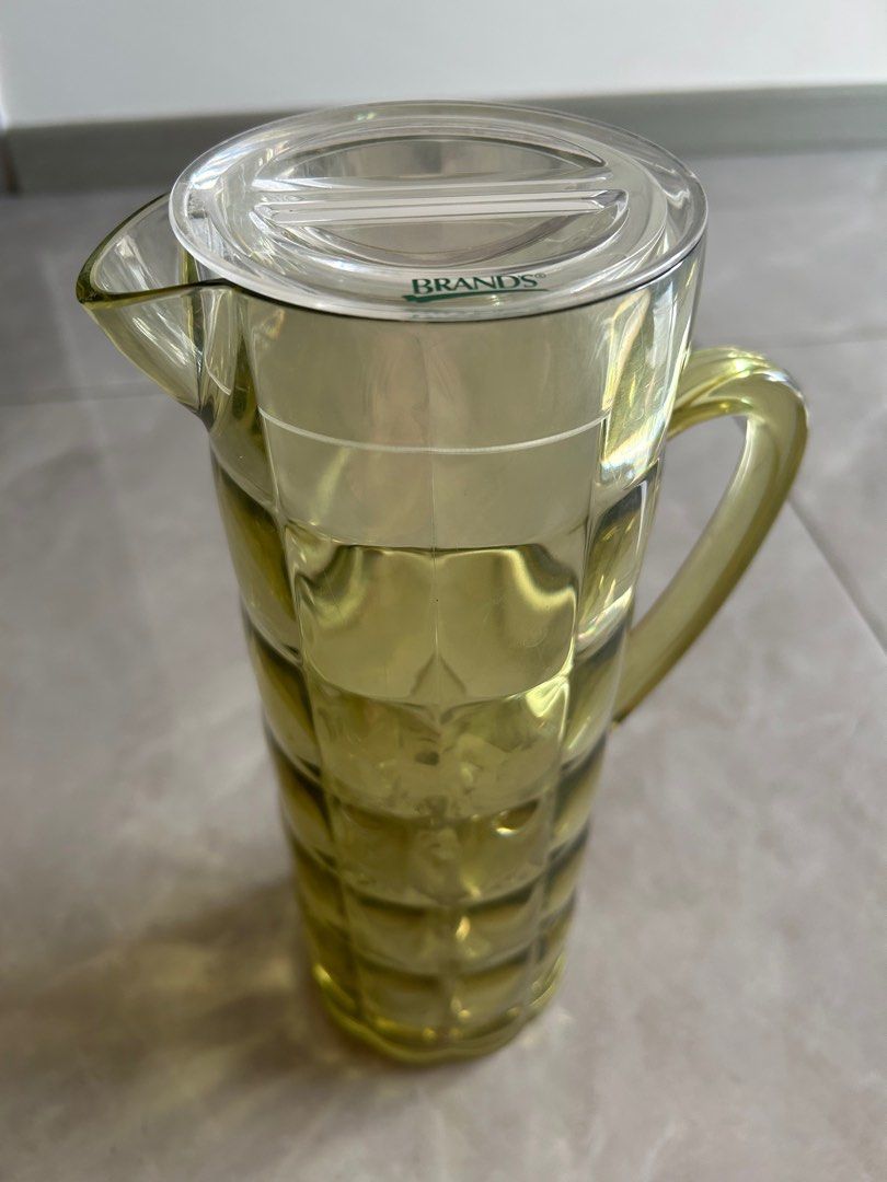 Plastic pitcher with matching mug